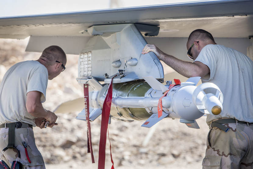 Air force personnel checks a GBU-49 Enhanced Paveway II, a so called dual mode weapon with laser and GPS for target guidance.