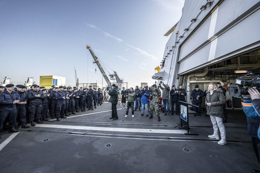 Ollongren at deck of ship.