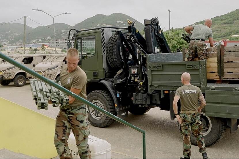 Military personnel provide assistance during Hurricane Fiona.