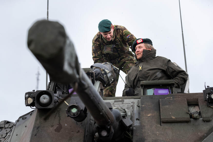 The king in a CV90 infantry fighting vehicle.