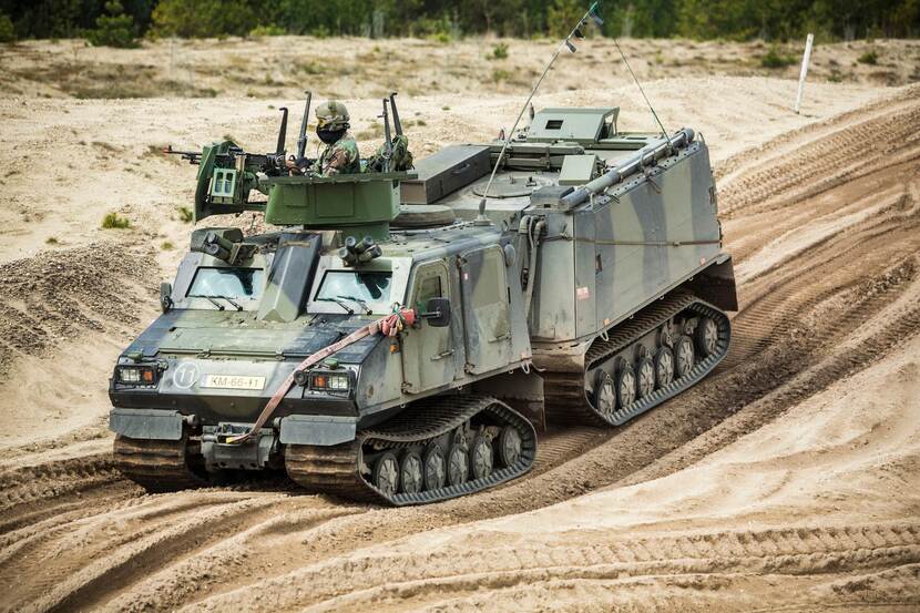 A Viking tracked articulated all-terrain armoured vehicle.