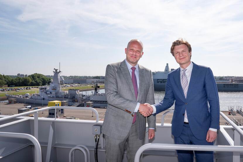 Defence ministers Defensie Ruben Brekelmans(re) and Theo Francken shake hands