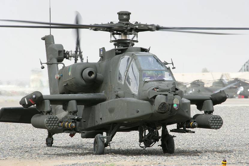 Apache attack helicopter on the ground.