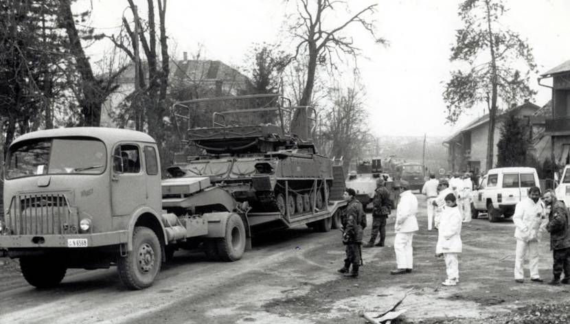 ECMM monitors supervise the withdrawal of the Yugoslavian army (JNA) from the Croatian town of Tulanj in December 1991.