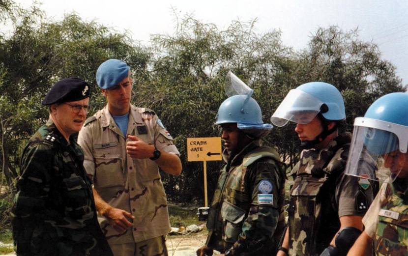 The Chief of the Defence Staff, Admiral L. Kroon, inspects miliary personnel from the multinational Mobile Force Reserve during a working visit to the UNFICYP contingent on Cyprus, March 1999.