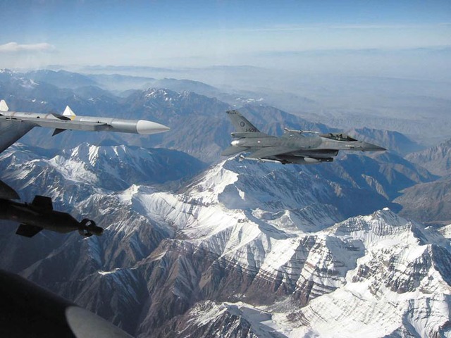 2 Royal Netherlands Air Force F-16 MLU fighters over the snow-covered mountains of Tajikistan while on their way to Afghanistan.