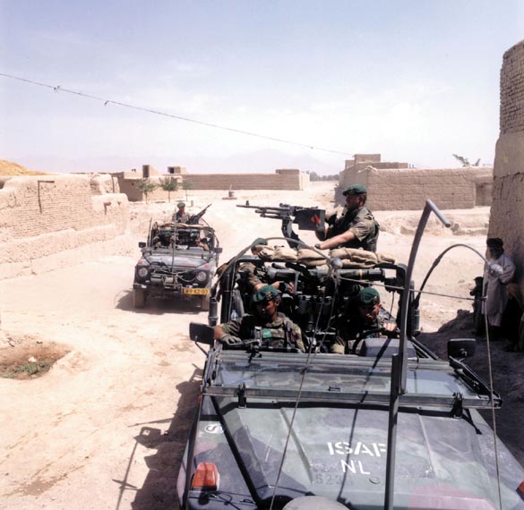 Men from the Commando Corps on patrol in the vicinity of Kabul. The Mercedes Benz all-terrain vehicles are equipped with a 7.62 M.A.G. machine gun.