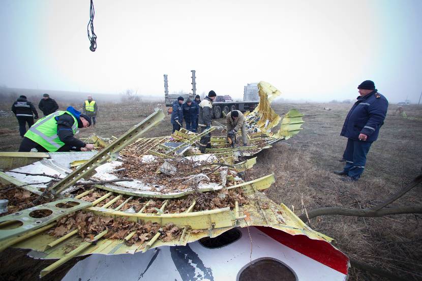 Wreckage in the field being prepared for transport.