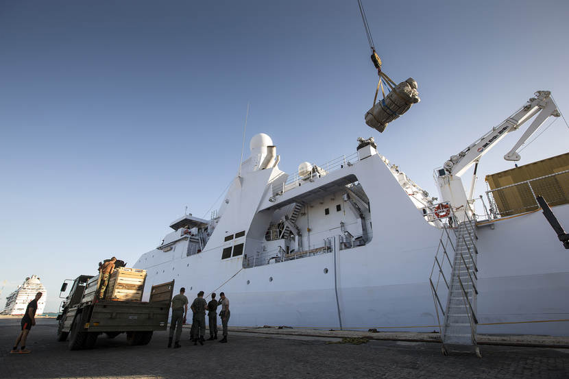 Loading operations of navy ship.
