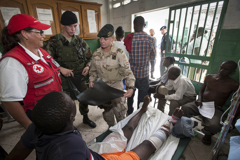 Dutch military personnel help out at the hospital in Les Cayes.