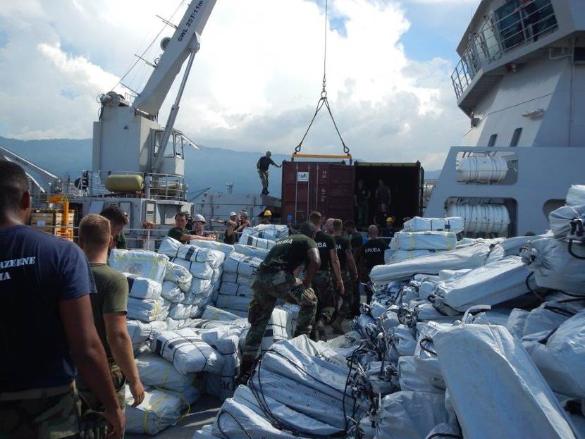 Support ship HNLMS Pelikaan with pallets full of relief supplies on board.